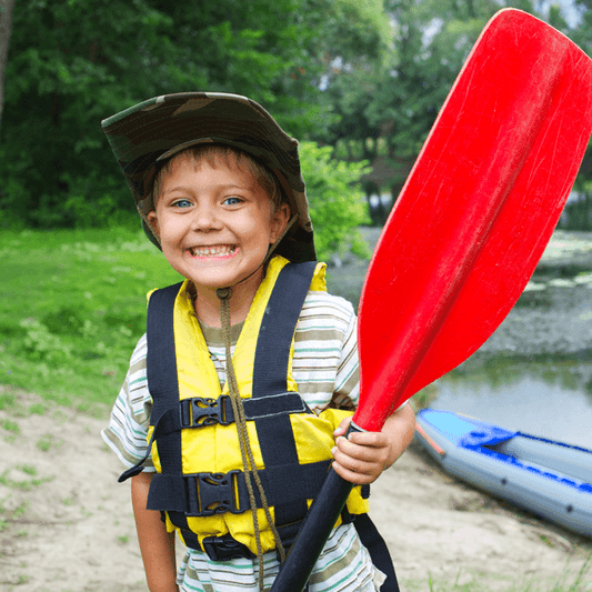 Happy Boy Getting Ready to Go Canoeing.