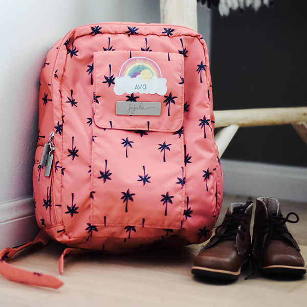 Cute rainbow name label for organization.