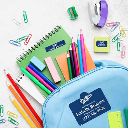 Part of deluxe school pack labels on backpack and school supplies.