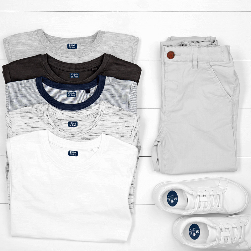 Part of camp pack labels on shirts and shoes.